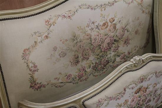 A Louis XV style cream painted and Aubusson tapestry upholstered double bed head, W.150cm